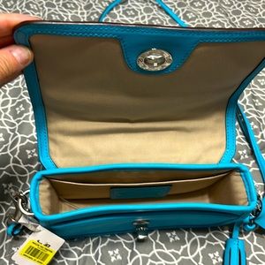 Selling a NWT Coach Purse